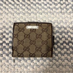 Gucci GG Canvas Bi-fold Wallet with Zip Coin Pocket & Snap Tab Closure